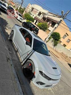 دۆج چارجەر